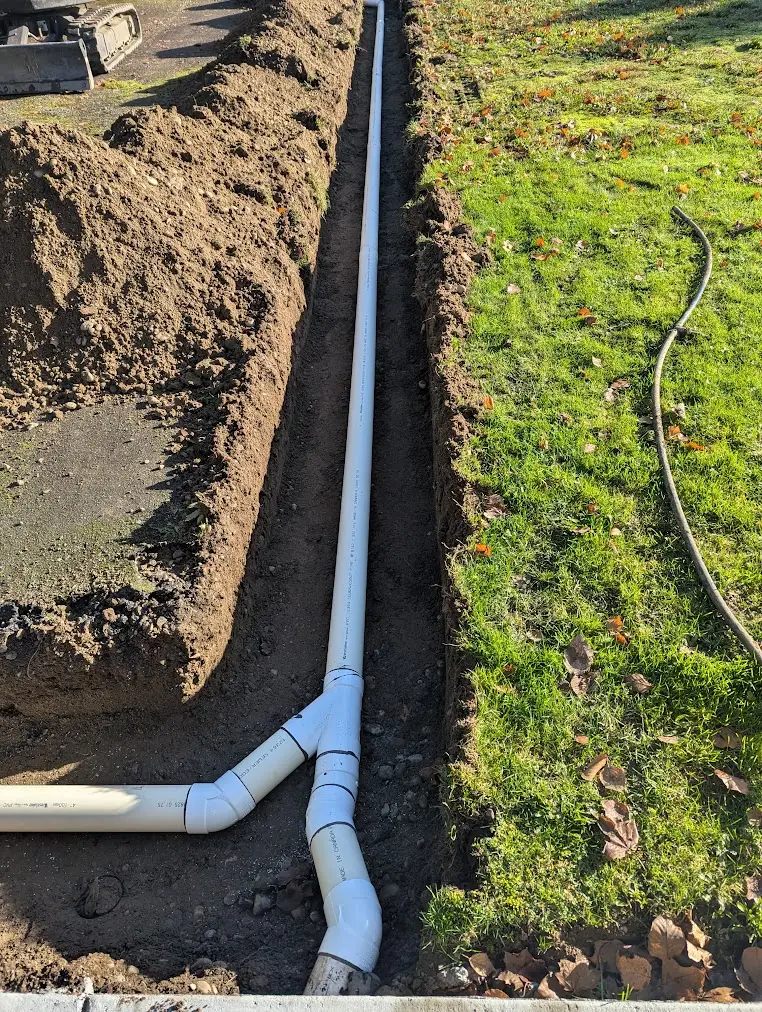Excavator preparing a Rosedale property for a new septic system
