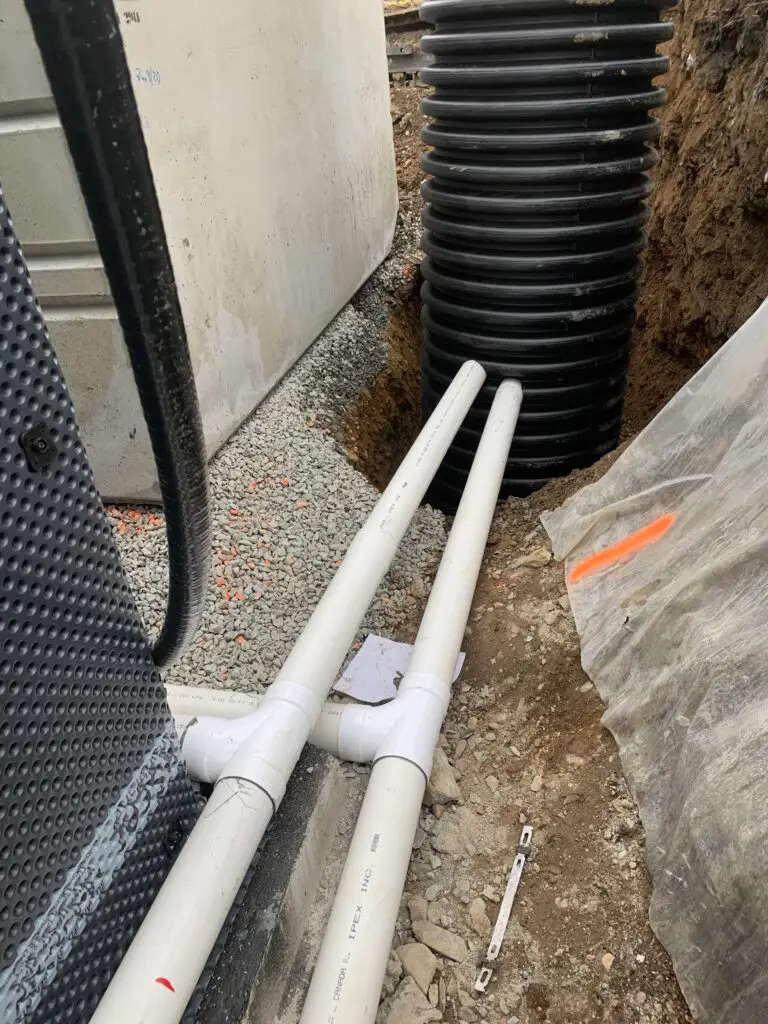 Excavator preparing a Popkum property for septic system installation