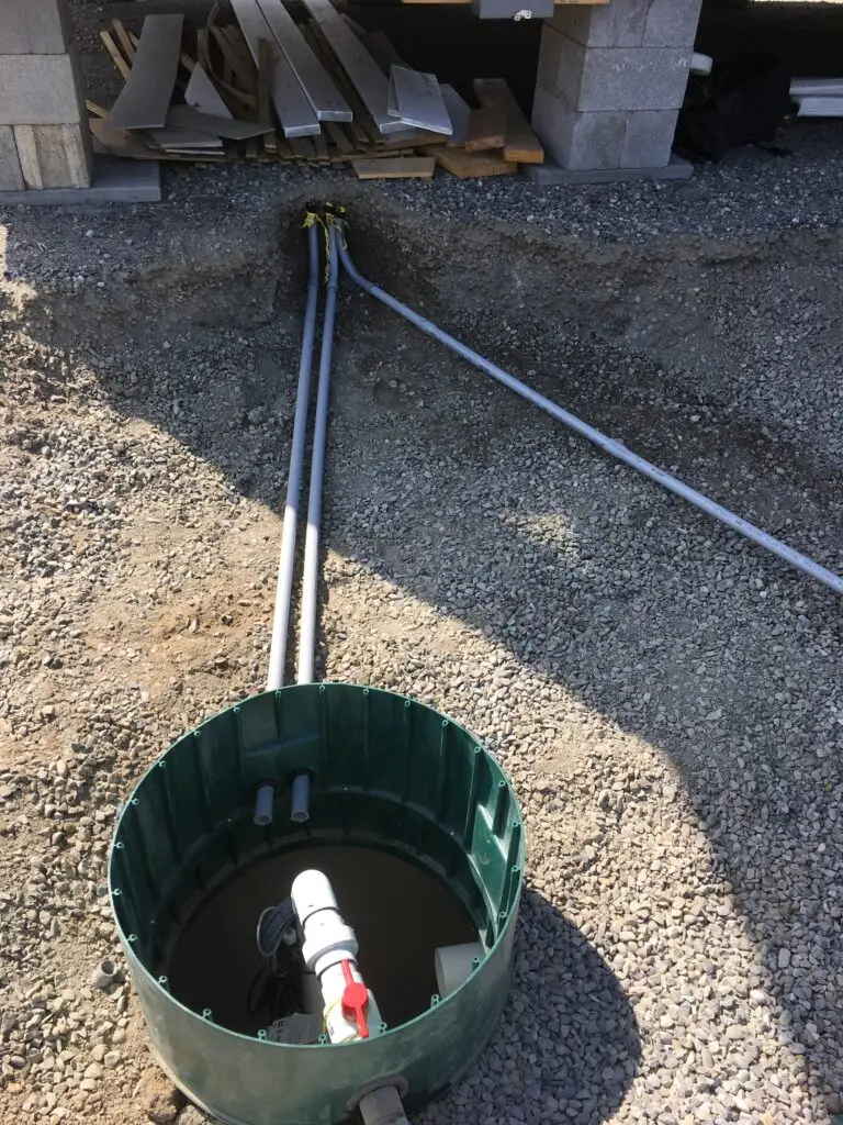 Excavator preparing a Yale property for septic system installation