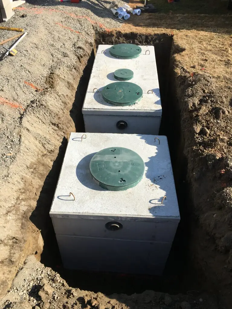 New septic tank installation during residential septic replacement