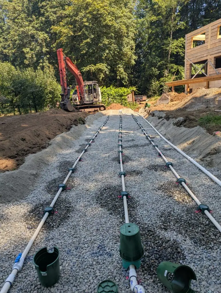 Residential septic tank being installed for a properly sized septic system
