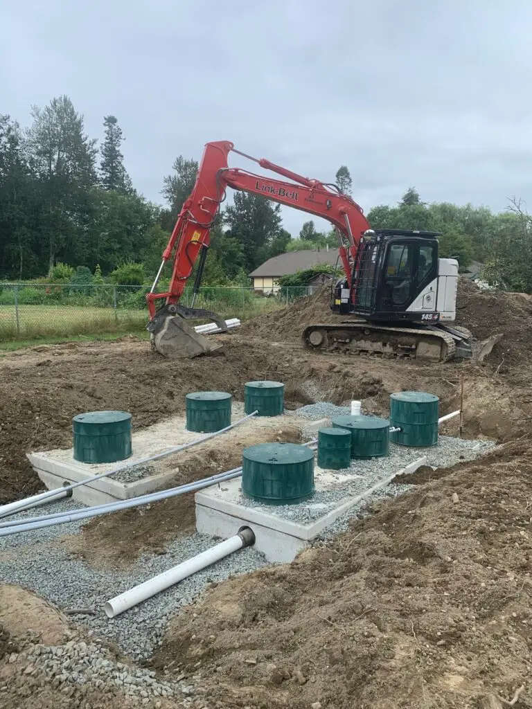 Types of Septic Tanks illustrated with concrete, plastic and fibreglass septic tanks installed underground.